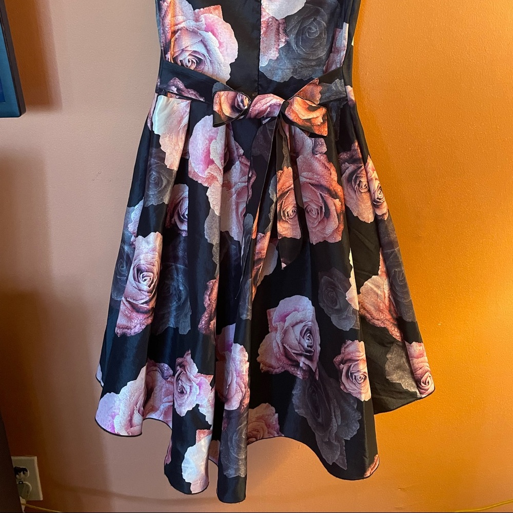Beautiful, lite floral high low dress size M Polyester/ spandex material